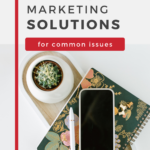 Text reads: "Pinterest Marketing Solutions"". An iPhone sits on top of a floral notebook.